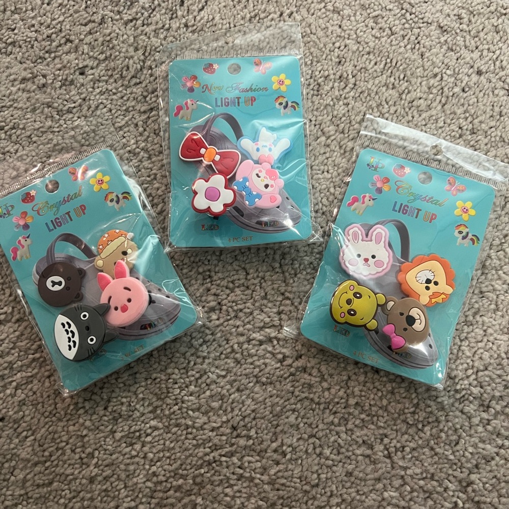 THREE packs of croc charms